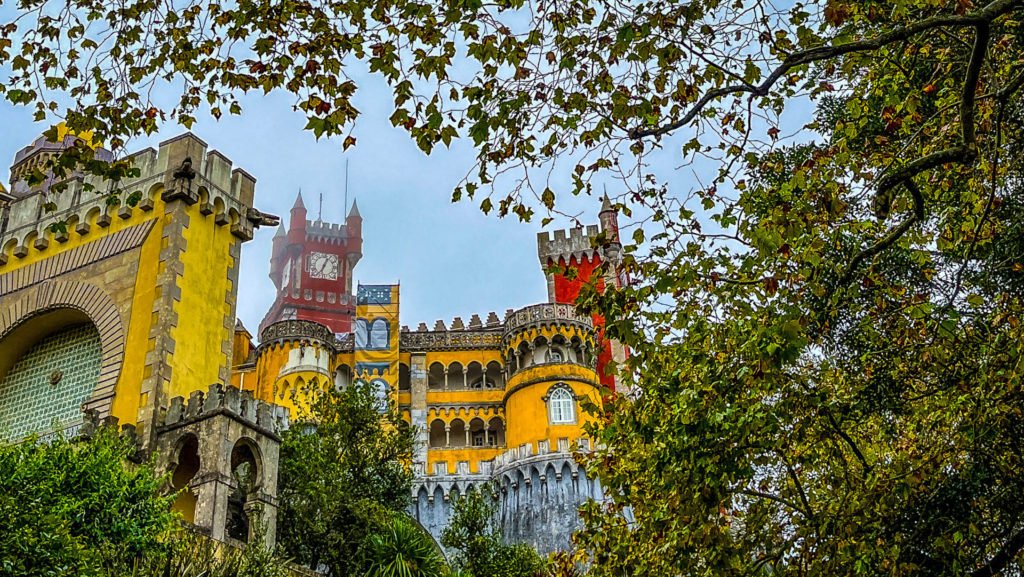 The colorful Pena Palace in Sintra that is included in your Sintra itinerary.