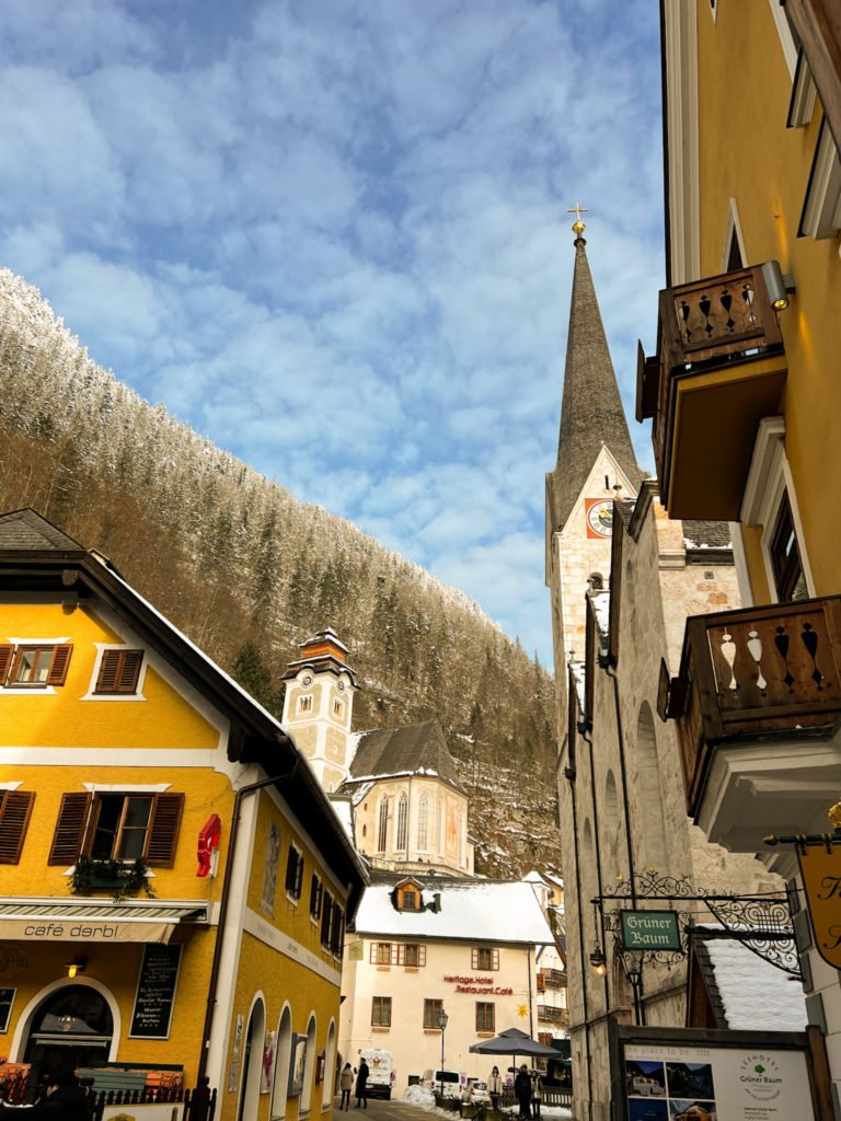 A few houses and a church's spire in Hallstatt.