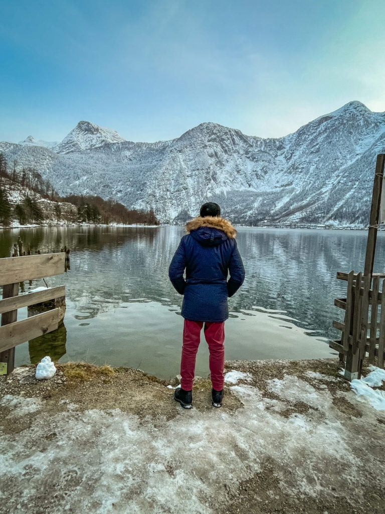 Roopesh from RooKiExplorers standing on the Hallstatt station's dock.