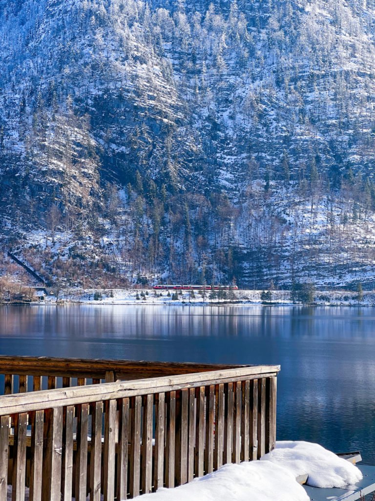 A train leaving the Hallstatt train station on the other side of the Hallstatt lake.