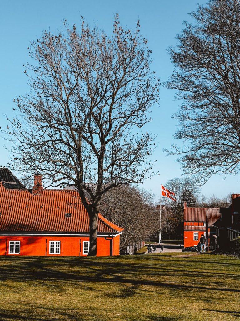 A part of the Kastellet in Copenhagen with the Denmark flag.