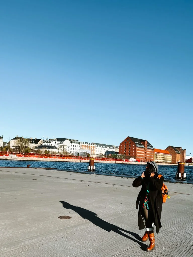 Kiki from RooKiExplorers posing in Copenhagen's waterfront.