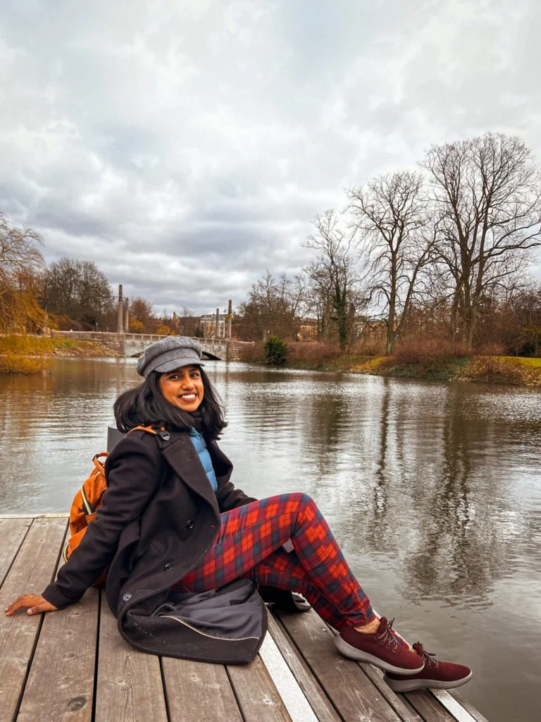 Kiki from RooKiExplorers sitting near the canal in Kungsparken, Malmo.