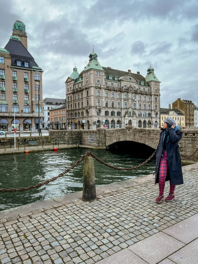 Kiki from RooKiExplorers strolling near a canal in Malmo.