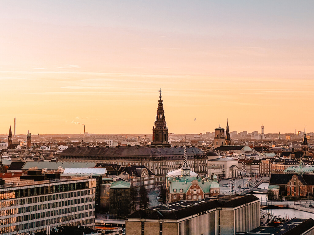 The view of Christiansborg Palace from the Stairway to Heaven during golden hour.