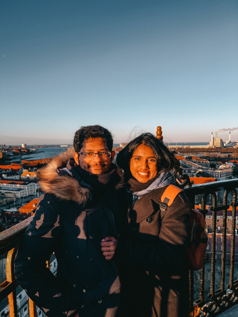 Roopesh and Kiki from RooKiExplorers posing on top of the Stairway to Heaven in Copenhagen.