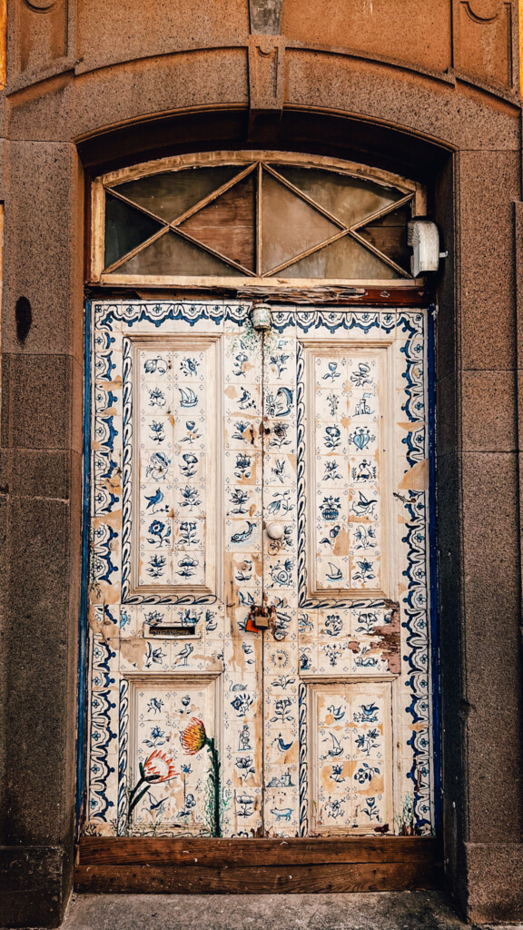 A random door with artwork in Rua de Santa Maria in Funchal, Madeira.