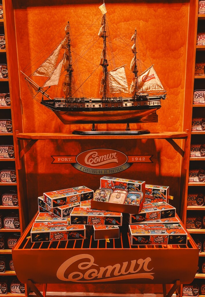 A model of a ship and some canned sardines in Comur, Faro.