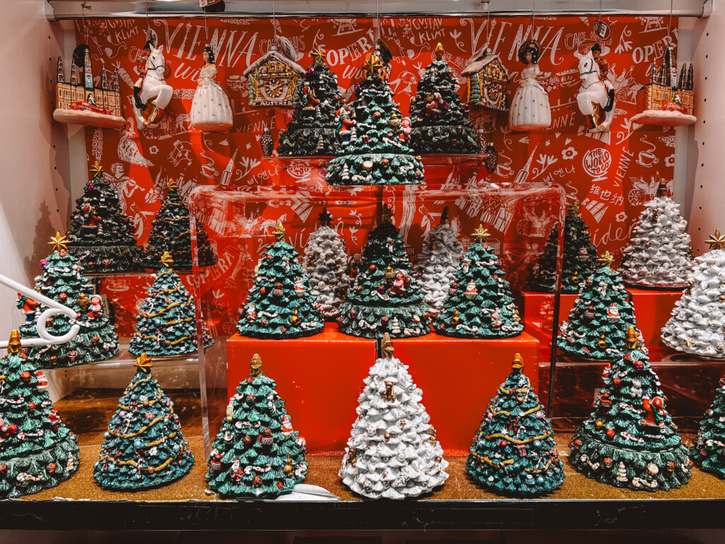 Small Christmas tree figures in a Christmas market stall in Vienna.