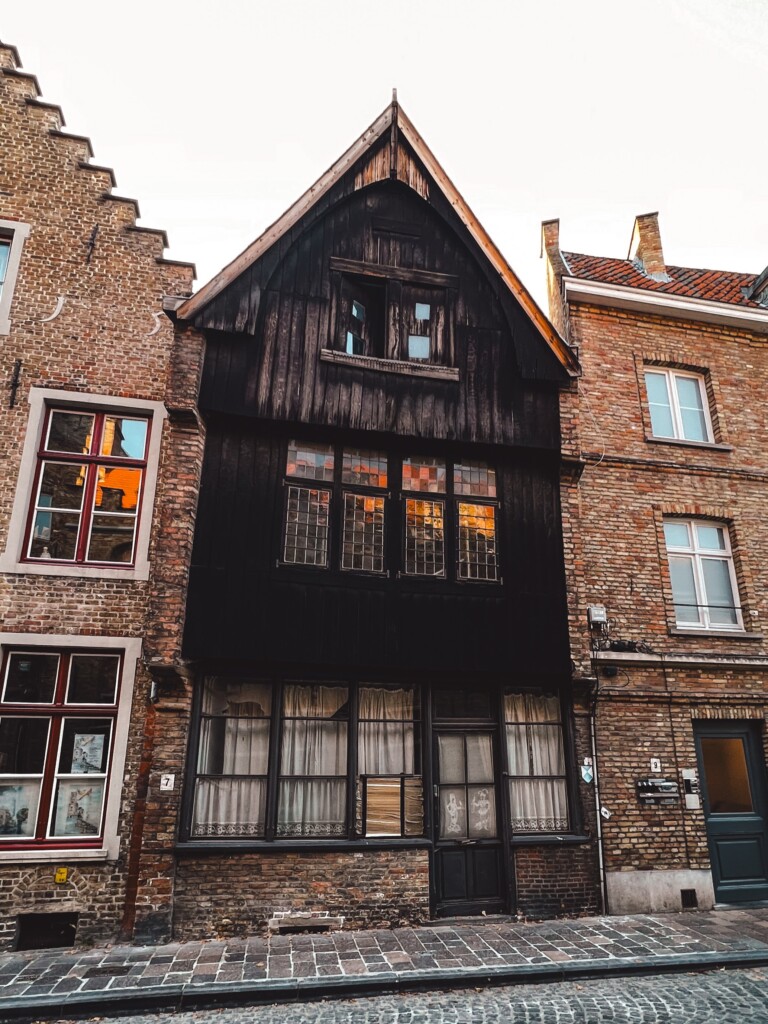 The charred house in Genthof 7, Bruges, Belgium.