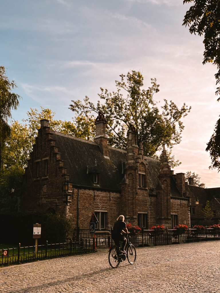 A man cycling near Sashuis in Bruges, Belgium.